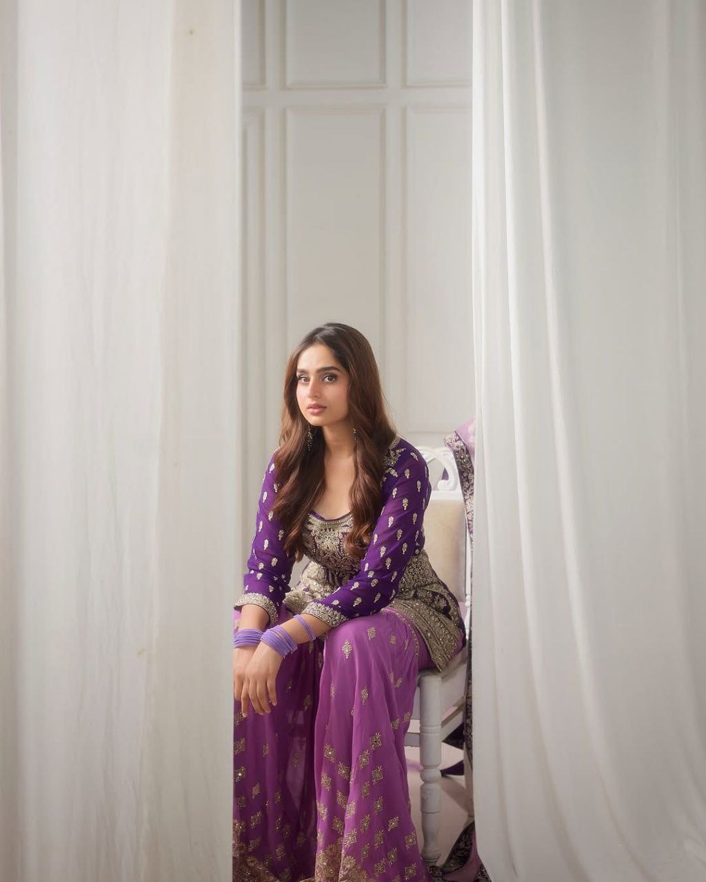 Purple Sharara Suit with Heavy Golden Embroidery & Net Dupatta