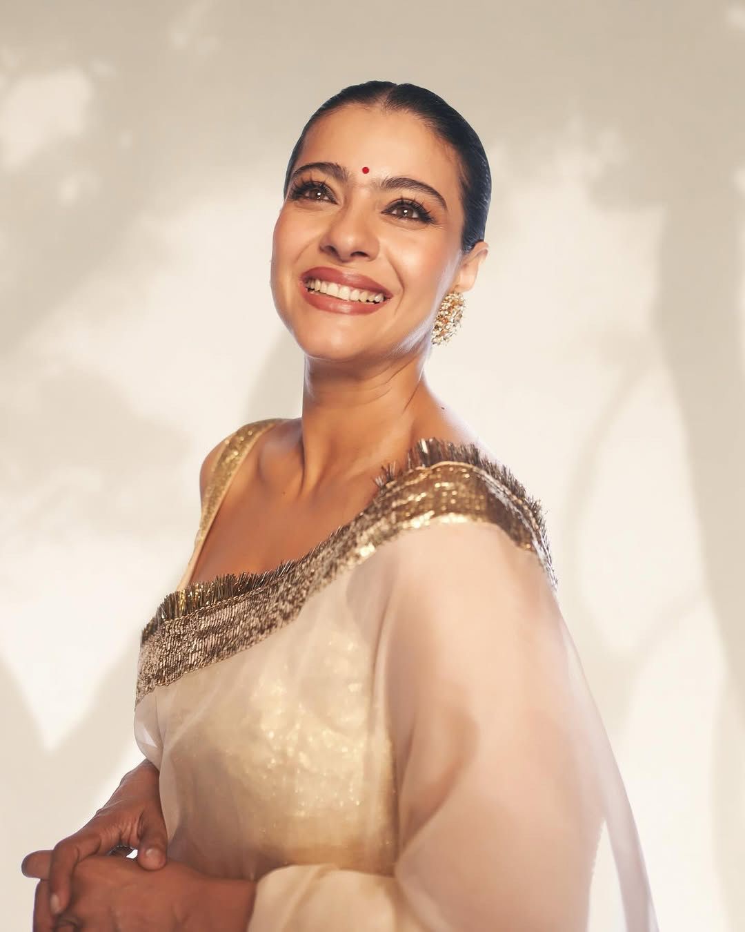 White Organza Saree with Metallic Golden Border